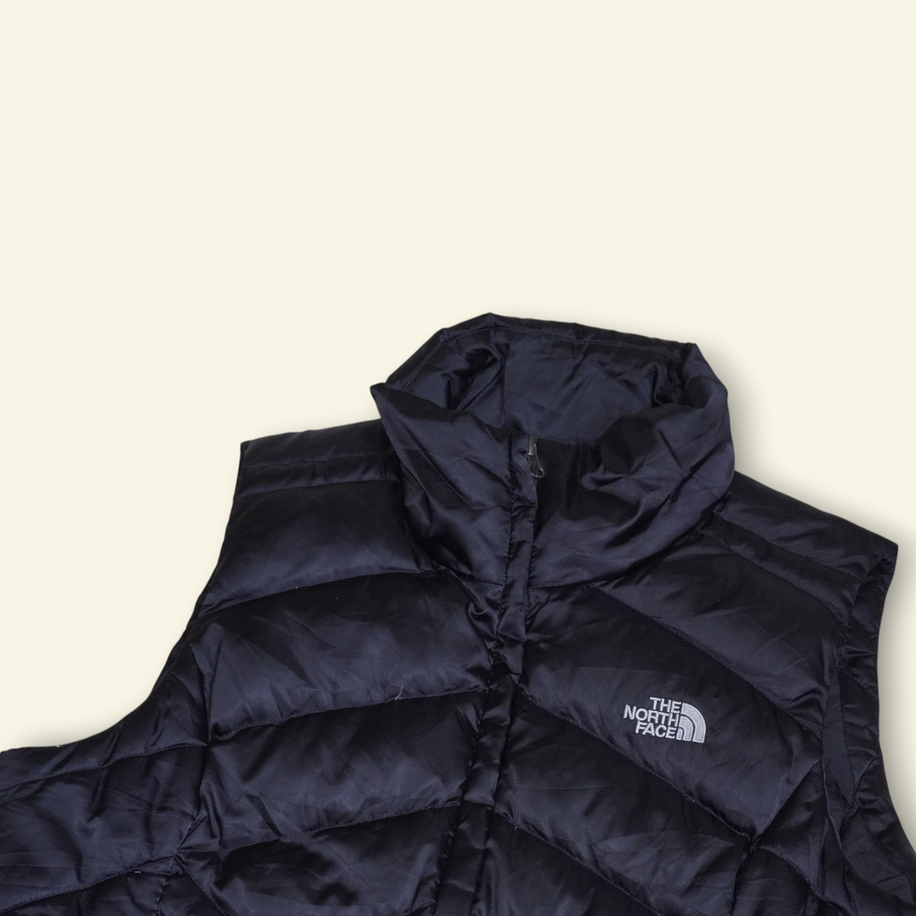 Chaleco negro The North Face Aconcagua con relleno de plumón y paneles acolchados de Mi tienda