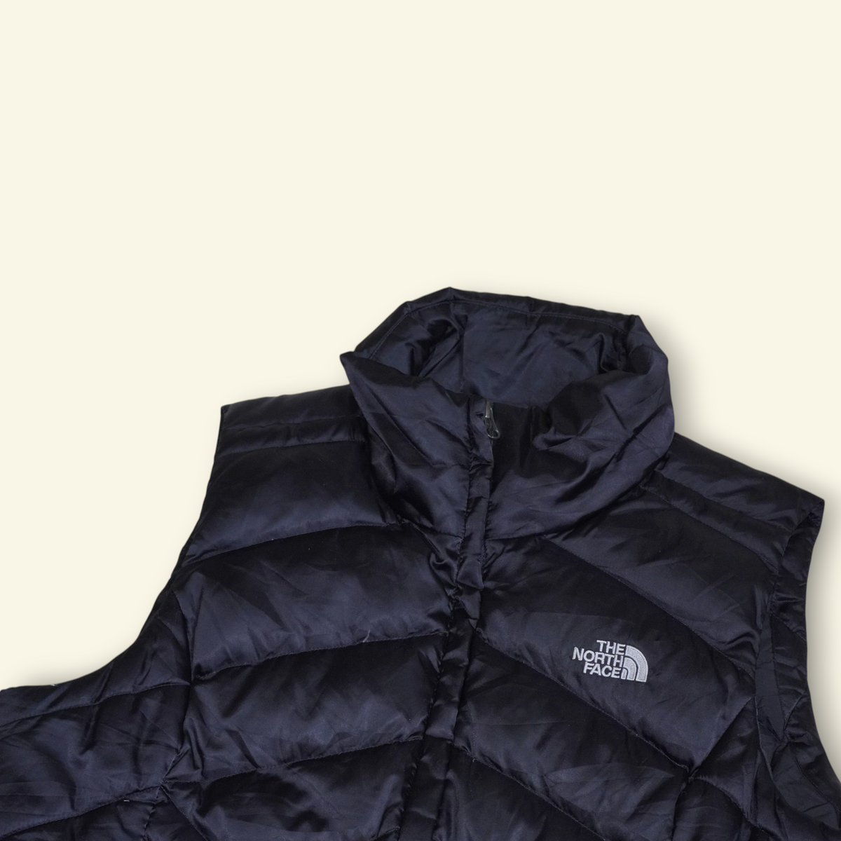 Chaleco negro The North Face Aconcagua con relleno de plumón y paneles acolchados de Mi tienda