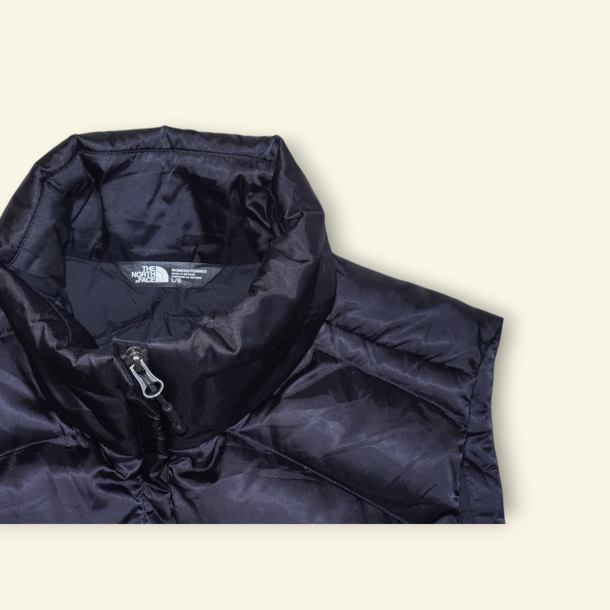 Chaleco negro de pluma The North Face Aconcagua con cuello alto y cierre frontal, marca Mi tienda