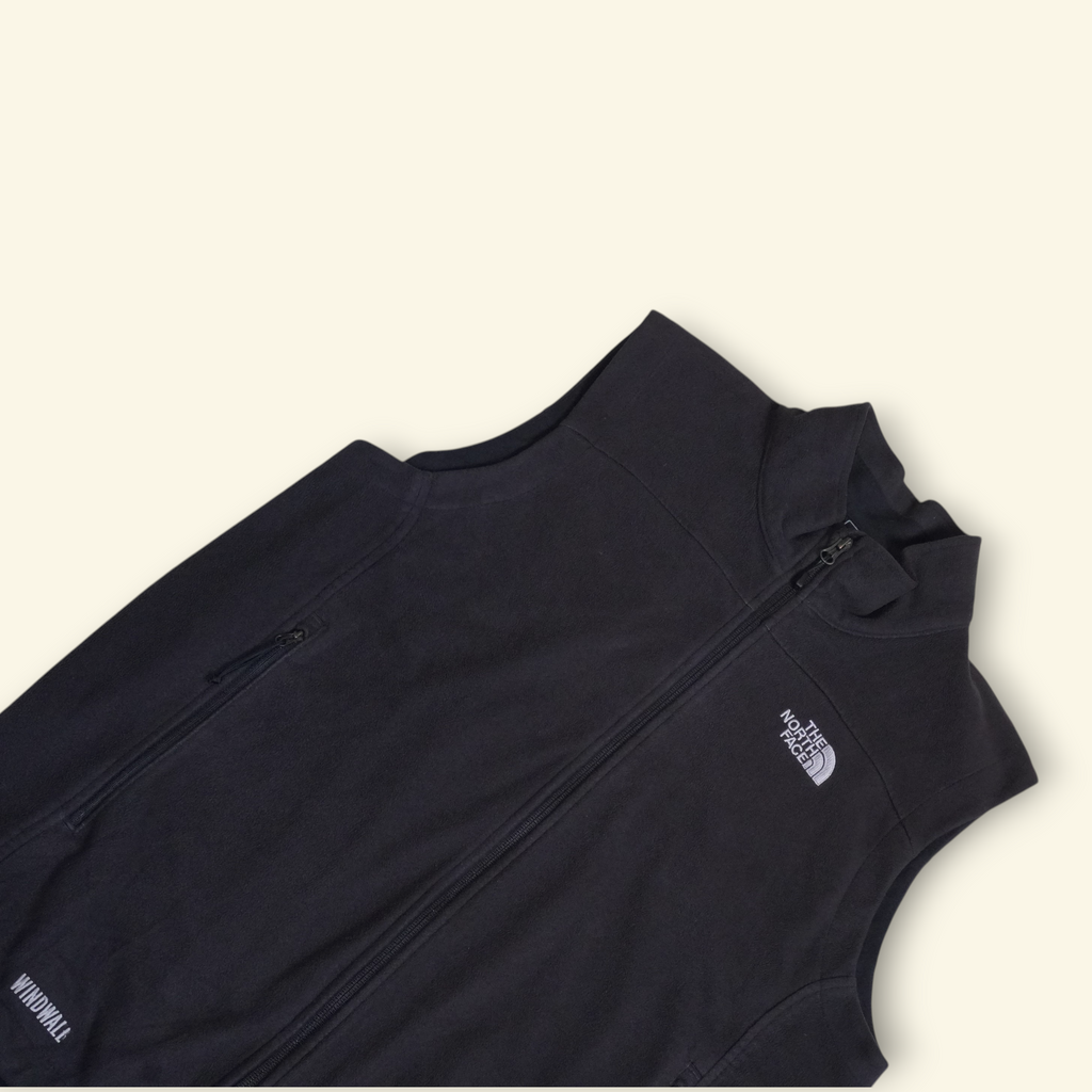 Chaleco negro The North Face Apex Bionic de Mi tienda, tejido Softshell WindWall con forro polar y cierre frontal.
