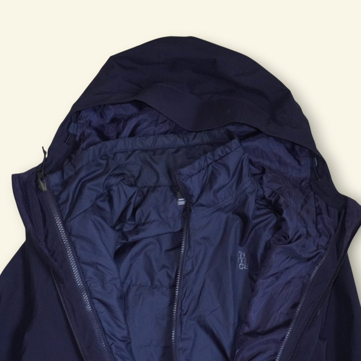 Chamarra azul marino 3 en 1 Mi tienda The North Face Carto Triclimate con sistema desmontable y capucha