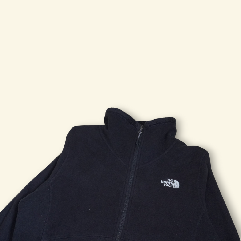 Chaqueta polar negra The North Face Morninglory de Mi tienda con cierre frontal y logo bordado en el pecho