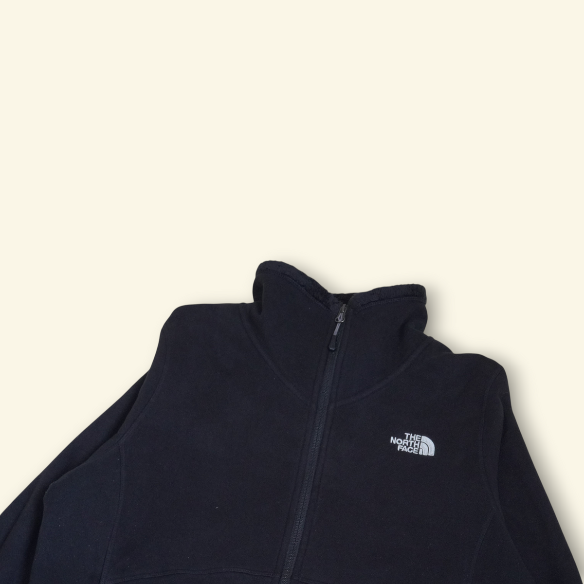 Chaqueta polar negra The North Face Morninglory de Mi tienda con cierre frontal y logo bordado en el pecho