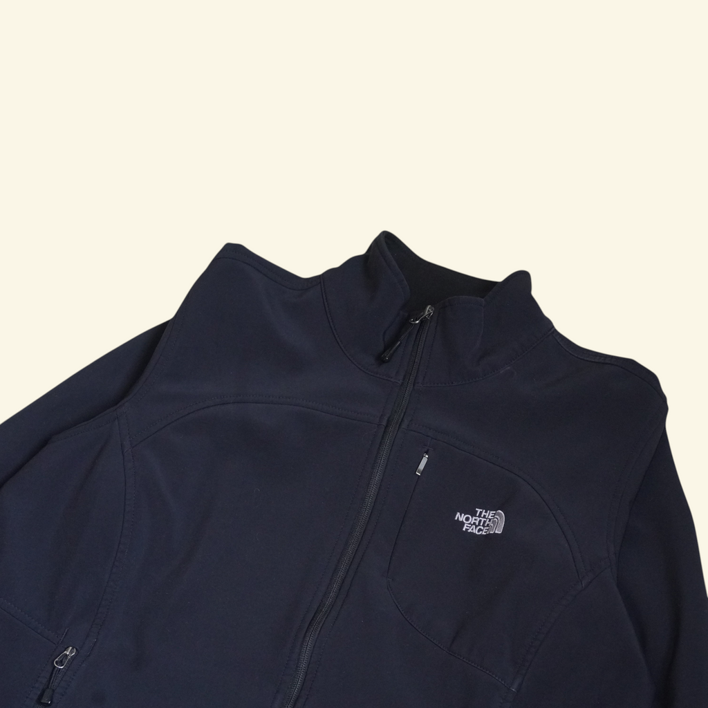 Chaqueta softshell negra The North Face Apex Bionic para mujer con cierre frontal y bolsillo en el pecho, Mi tienda