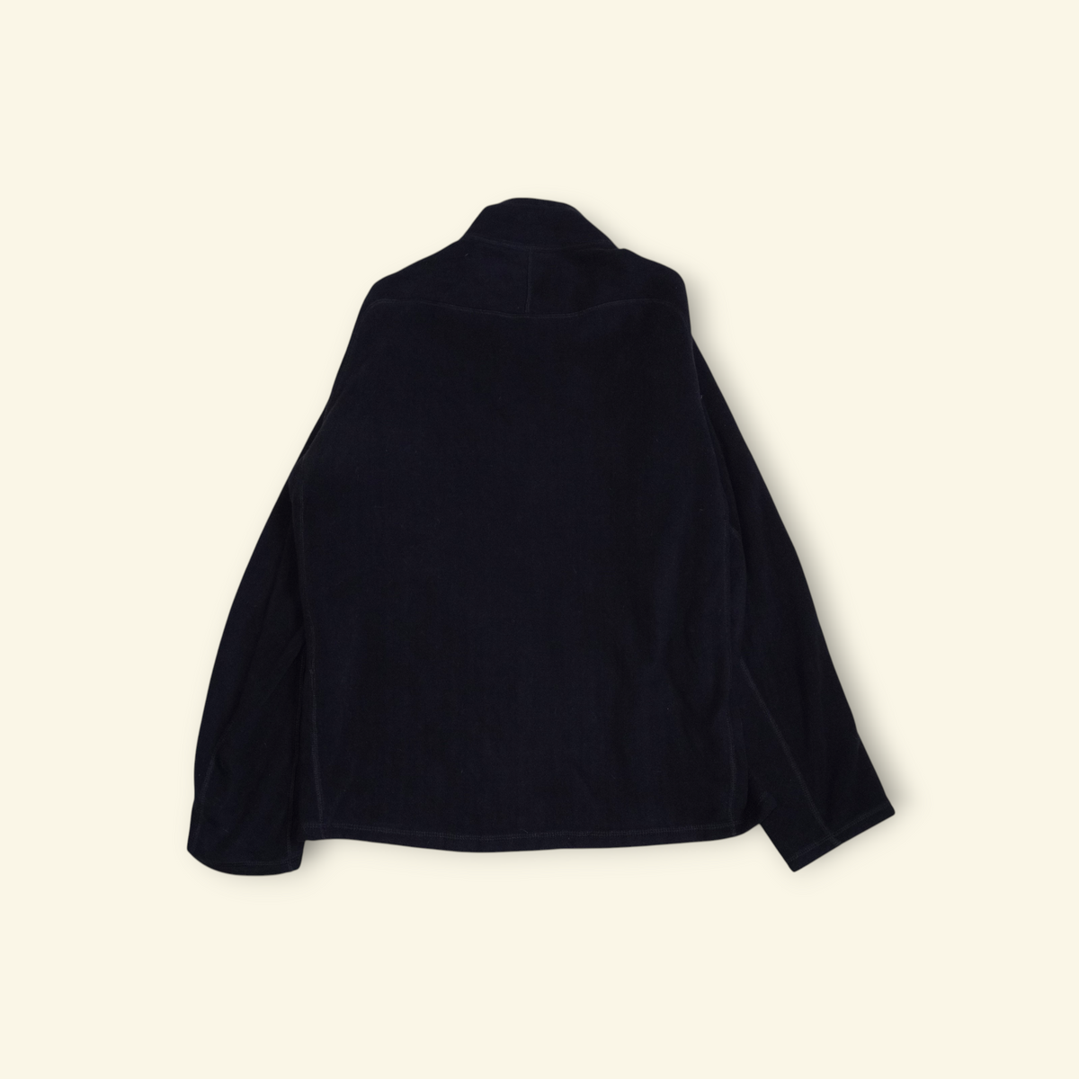 Vista trasera de la chamarra Patagonia R3 Regulator Fleece negra, diseño técnico de alta densidad para alpinismo.