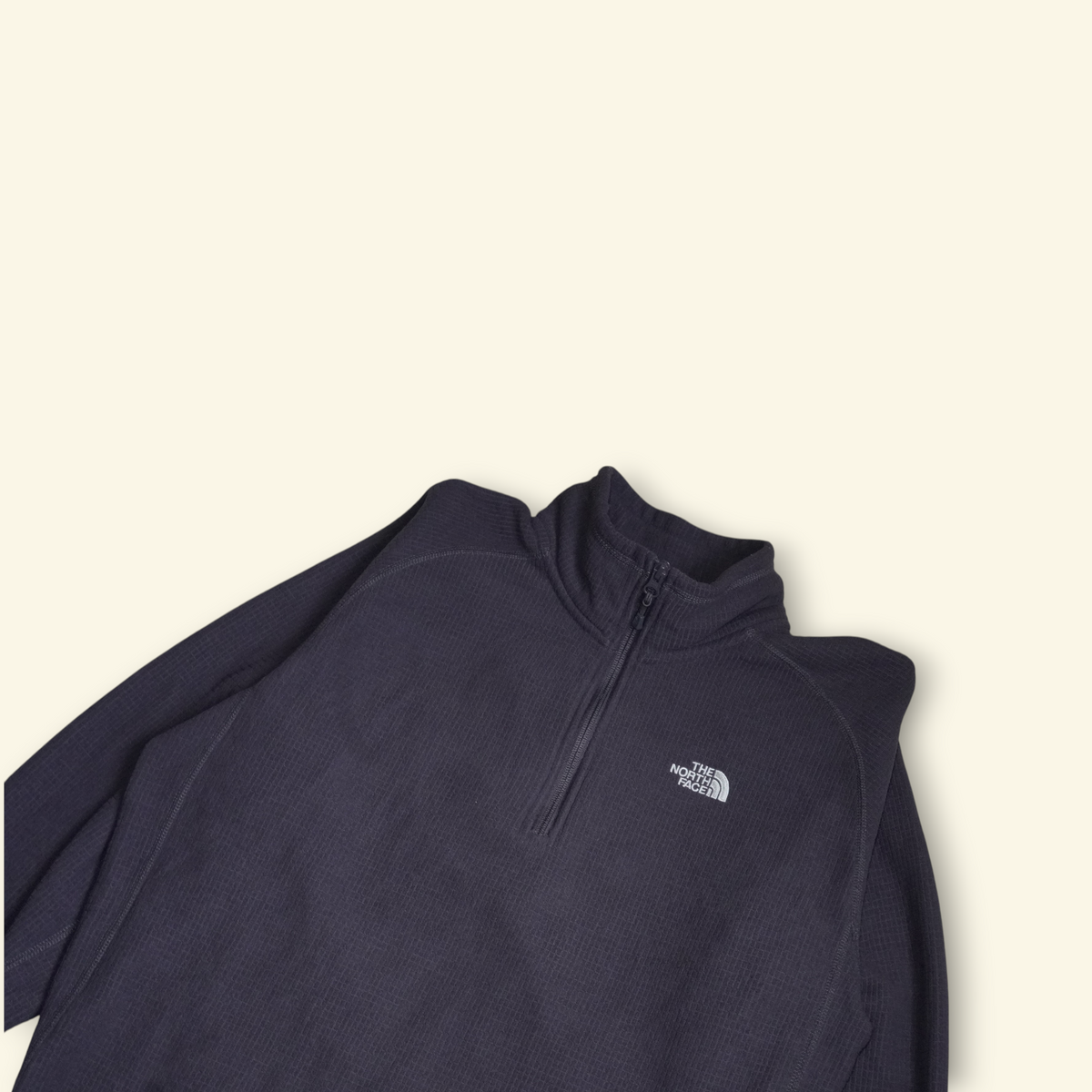 Suéter negro The North Face Gordon Lyons de tejido fleece con cuello alto y cierre frontal, disponible en Mi tienda.